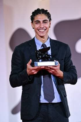 Venice Winners Red Carpet AM Giacomo Covi poses with Orizzonti Best Actor Award for Un Anno di Scuola (A Year of School) attending the Winners Red Carpet of the 82nd Venice International Film Festival at the Lido in Venice, Italy on September 06, 2025. Photo by Aurore Marechal ABACAPRESS.COM Venice Italy  Copyright: xMarechalxAurore ABACAx