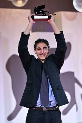 Venice Winners Red Carpet AM Giacomo Covi poses with Orizzonti Best Actor Award for Un Anno di Scuola (A Year of School) attending the Winners Red Carpet of the 82nd Venice International Film Festival at the Lido in Venice, Italy on September 06, 2025. Photo by Aurore Marechal ABACAPRESS.COM Venice Italy  Copyright: xMarechalxAurore ABACAx