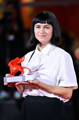 Venice Winners Red Carpet AM Nastia Korkia poses with the Luigi De Laurentis Award for Debut Film for Short Summer attending the Winners Red Carpet of the 82nd Venice International Film Festival at the Lido in Venice, Italy on September 06, 2025. Photo by Aurore Marechal ABACAPRESS.COM Venice Italy  Copyright: xMarechalxAurore ABACAx
