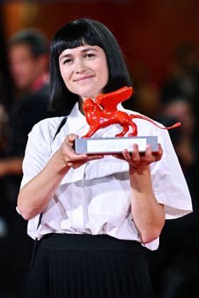 Venice Winners Red Carpet AM Nastia Korkia poses with the Luigi De Laurentis Award for Debut Film for Short Summer attending the Winners Red Carpet of the 82nd Venice International Film Festival at the Lido in Venice, Italy on September 06, 2025. Photo by Aurore Marechal ABACAPRESS.COM Venice Italy  Copyright: xMarechalxAurore ABACAx