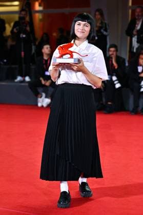 Venice Winners Red Carpet AM Nastia Korkia poses with the Luigi De Laurentis Award for Debut Film for Short Summer attending the Winners Red Carpet of the 82nd Venice International Film Festival at the Lido in Venice, Italy on September 06, 2025. Photo by Aurore Marechal ABACAPRESS.COM Venice Italy  Copyright: xMarechalxAurore ABACAx