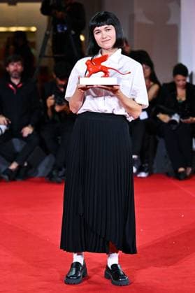 Venice Winners Red Carpet AM Nastia Korkia poses with the Luigi De Laurentis Award for Debut Film for Short Summer attending the Winners Red Carpet of the 82nd Venice International Film Festival at the Lido in Venice, Italy on September 06, 2025. Photo by Aurore Marechal ABACAPRESS.COM Venice Italy  Copyright: xMarechalxAurore ABACAx