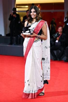 Venice Winners Red Carpet AM Anuparna Roy poses with the Orizzonti Best Director Award for Songs of Forgotten Trees attending the Winners Red Carpet of the 82nd Venice International Film Festival at the Lido in Venice, Italy on September 06, 2025. Photo by Aurore Marechal ABACAPRESS.COM Venice Italy  Copyright: xMarechalxAurore ABACAx