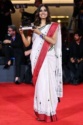 Venice Winners Red Carpet AM Anuparna Roy poses with the Orizzonti Best Director Award for Songs of Forgotten Trees attending the Winners Red Carpet of the 82nd Venice International Film Festival at the Lido in Venice, Italy on September 06, 2025. Photo by Aurore Marechal ABACAPRESS.COM Venice Italy  Copyright: xMarechalxAurore ABACAx