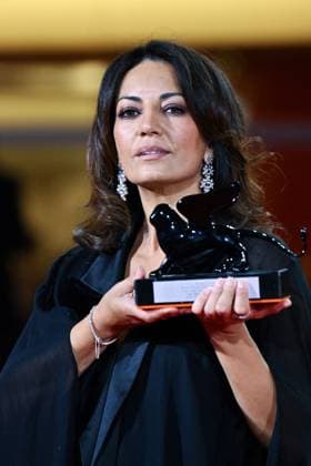 Venice Winners Red Carpet AM Maryam Touzani poses with the Venice Spotlight Armani Beauty Audience Award for Calle Malaga attending the Winners Red Carpet of the 82nd Venice International Film Festival at the Lido in Venice, Italy on September 06, 2025. Photo by Aurore Marechal ABACAPRESS.COM Venice Italy  Copyright: xMarechalxAurore ABACAx