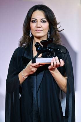 Venice Winners Red Carpet AM Maryam Touzani poses with the Venice Spotlight Armani Beauty Audience Award for Calle Malaga attending the Winners Red Carpet of the 82nd Venice International Film Festival at the Lido in Venice, Italy on September 06, 2025. Photo by Aurore Marechal ABACAPRESS.COM Venice Italy  Copyright: xMarechalxAurore ABACAx