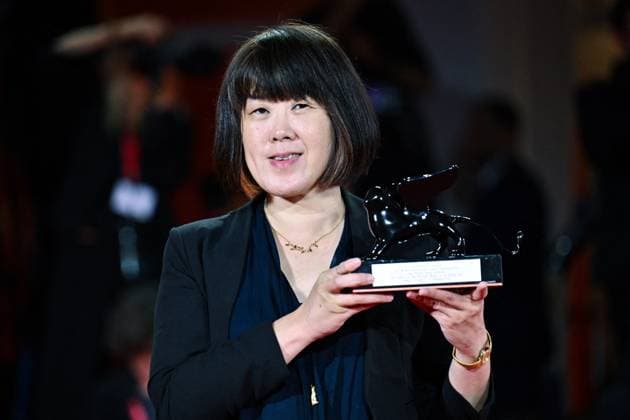 Venice Winners Red Carpet AM Singing Chen poses with the Grand Prize for The Clouds Are Two Thousand Meters Up attending the Winners Red Carpet of the 82nd Venice International Film Festival at the Lido in Venice, Italy on September 06, 2025. Photo by Aurore Marechal ABACAPRESS.COM Venice Italy  Copyright: xMarechalxAurore ABACAx