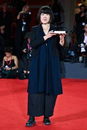 Venice Winners Red Carpet AM Singing Chen poses with the Grand Prize for The Clouds Are Two Thousand Meters Up attending the Winners Red Carpet of the 82nd Venice International Film Festival at the Lido in Venice, Italy on September 06, 2025. Photo by Aurore Marechal ABACAPRESS.COM Venice Italy  Copyright: xMarechalxAurore ABACAx