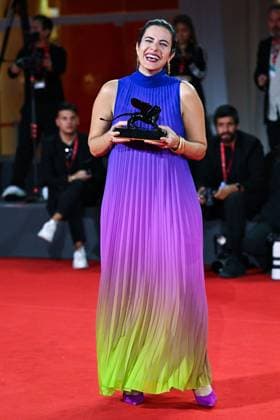 Venice Winners Red Carpet AM Negar Motevalymeidanshah poses with the Venice Immersive Special Jury Prize for Less Than 5gr of Saffron attending the Winners Red Carpet of the 82nd Venice International Film Festival at the Lido in Venice, Italy on September 06, 2025. Photo by Aurore Marechal ABACAPRESS.COM Venice Italy  Copyright: xMarechalxAurore ABACAx