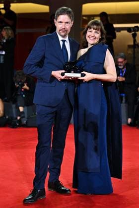 Venice Winners Red Carpet AM Victor Maes and Kate Voet pose with the Venice Immersive Achievement Prize for A Long Goodbye attending the Winners Red Carpet of the 82nd Venice International Film Festival at the Lido in Venice, Italy on September 06, 2025. Photo by Aurore Marechal ABACAPRESS.COM Venice Italy  Copyright: xMarechalxAurore ABACAx