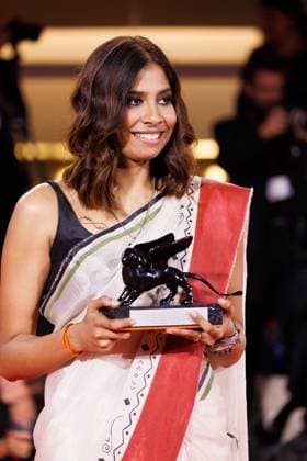News - 2025 Winners Photocall - The 82nd Venice International Film Festival Anuparna Roy poses with the Orizzonti Best Director Award for Songs of Forgotten Treesduring the winners photocall at the 82nd Venice International Film Festival on September 06, 2025 in Venice, Italy. Photo: Cinzia Camela. Lido di Venezia Palazzo del Cinema Italy Copyright: xCinziaxCamelax xLiveMediax LPN_2013001