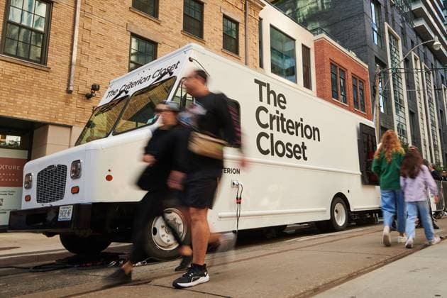 September 7, 2025, Toronto, On, Canada: Festival-goers pass the Criterion Closet mobile video library during its stop at the Toronto International Film Festival in Toronto, on Sunday, Sept. 7, 2025. Toronto Canada  - ZUMAc35_ 20250907_zaf_c35_007 Copyright: xSammyxKoganx