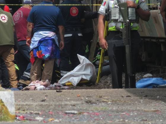 (250908) -- ATLACOMULCO(MEXICO), Sept. 8, 2025 -- Rescue workers work at the accident site in the Atlacomulco municipality, the State of Mexico, Mexico, Sept. 8, 2025. At least eight people were killed and 45 others injured early Monday when a double-deck passenger bus was hit by a train in central Mexico, authorities said. (Photo by Jorge Alvarado Xinhua) MEXICO-ATLACOMULCO-CRASH-ACCIDENT LixMengxintonglian 
