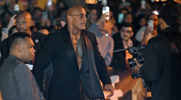 Dwayne Johnson arrives for the Toronto International Film Festival premiere of The Smashing Machine at the Princess of Wales Theatre in Toronto, Canada on Monday, September 8, 2025.  TOR2025090837 CHRISxCHEW