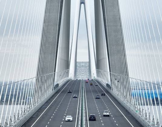 (250909) -- CHANGZHOU, Sept. 9, 2025 -- An aerial drone photo taken on Sept. 9, 2025 shows vehicles running on the Changtai Yangtze River Bridge in east China s Jiangsu Province. The Changtai (Changzhou-Taizhou) Yangtze River Bridge, an artery of communications that integrates highways, intercity railways, and local roads, started operation on Tuesday. Spanning 10.03 kilometers, the bridge slashes travel time between Changzhou and Taizhou, both in Jiangsu Province, from 80 minutes to 20 minutes, boosting development for the Yangtze economic belt and integration of the Yangtze River delta region. (Photo by Xinhua) CHINA-JIANGSU-CHANGTAI YANGTZE RIVER BRIDGE-STARTING OPERATION (CN) ChenxWei 