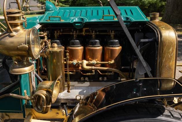 Historic 120-year-old Ford which was first to have engine in front on sale for £200,000 Story from Jam Press (Historic Ford Sale) Pictured: The 1905 Ford Model B Side Entrance Tonneau. Historic 120-year-old Ford which was first to have engine in front on sale for £200,000 An historic 120-year-old Ford car which was the first to have an engine in the front is on sale for £200,000. The 1905 green Model B is one of just seven left in the world. It was also the first to have a four-cylinder engine and is described as historically significant. The vintage car has a top speed of 40mph - which outpaced competitors when it was made. It has been in the same family for at least 60 years. The vehicle is being sold on 9 October by RM Sotheby s  Copyright: xJamxPress DavidxBush CourtesyxofxRMxSotheby s