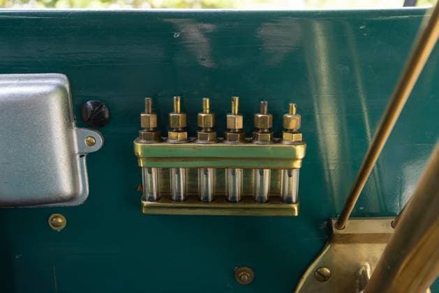 Historic 120-year-old Ford which was first to have engine in front on sale for £200,000 Story from Jam Press (Historic Ford Sale) Pictured: The 1905 Ford Model B Side Entrance Tonneau. Historic 120-year-old Ford which was first to have engine in front on sale for £200,000 An historic 120-year-old Ford car which was the first to have an engine in the front is on sale for £200,000. The 1905 green Model B is one of just seven left in the world. It was also the first to have a four-cylinder engine and is described as historically significant. The vintage car has a top speed of 40mph - which outpaced competitors when it was made. It has been in the same family for at least 60 years. The vehicle is being sold on 9 October by RM Sotheby s  Copyright: xJamxPress DavidxBush CourtesyxofxRMxSotheby s