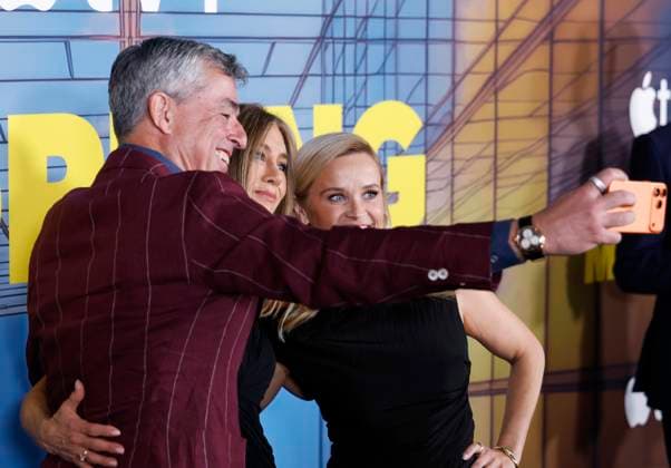 Eddy Cue, Apple Senior Vice President, Services, Reese Witherspoon and Jennifer Aniston celebrate the season four premiere of The Morning Show at MoMA in New York, with the new iPhone 17 Pro Max in cosmic orange, announced today at Apple Park. on Tuesday, September 9, 2025 in New York City. The fourth season of the critically acclaimed drama debuts globally on Apple TV+ on Wednesday, September 17, 2025.  NYP20250909122 JOHNxANGELILLO