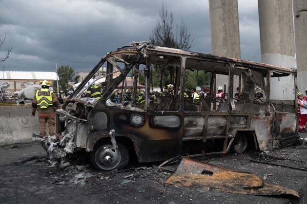 A bus burned is seen at the explosion scene occurred when a gas tanker overturned, causing the tragic accident that left 70 people have been injured, three dead, and two unidentified at Calzada Ignacio Zaragoza, near the Puente de la Concordia, . on September 10, 2025 in Mexico City, Mexico. Mexico City Mexico - ZUMAe321 20250910_zia_e321_052 Copyright: xMarcoxGonzalezx