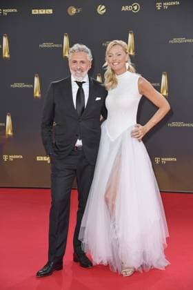 Roland Trettl and Miriam Höller arriving at the German Television Award ceremony at the MMC Studios in Cologne on 10 09 2025