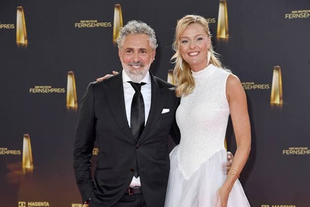 Roland Trettl and Miriam Höller arriving at the German Television Award ceremony at the MMC Studios in Cologne on 10 09 2025