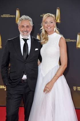 Roland Trettl and Miriam Höller arriving at the German Television Award ceremony at the MMC Studios in Cologne on 10 09 2025