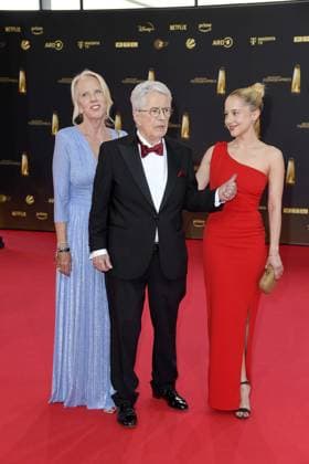 Britta Gessler, Frank Elstner and Enya Elstner arriving at the German Television Award ceremony at the MMC Studios in Cologne on 10 09 2025