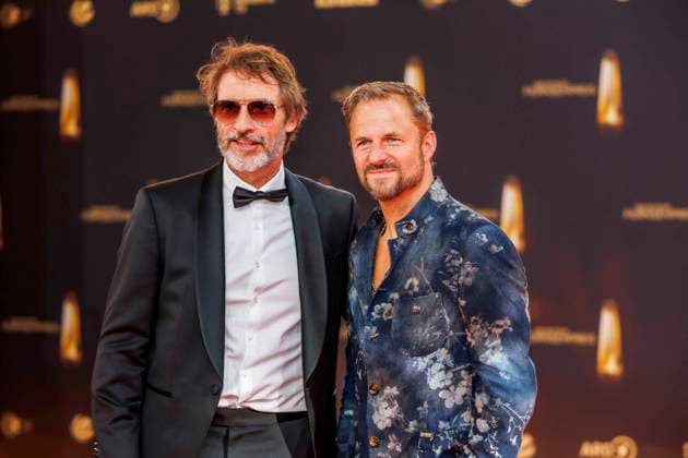 abb Guido Broscheit and Philipp Hochmair as guests on the red carpet at the German Television Award 2025 ceremony at the MMC Studios on 0 09 2025 in Cologne NRW Germany