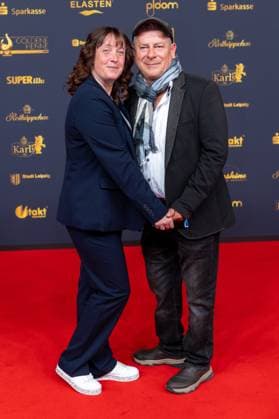 Goldene Henne 2025 award ceremony 12 09 2025 Leipzig, Messe Allee 1 Leipziger Messe In the photo Michael Hiter, musician with partner Sandra On Friday evening, the Golden Copyright: xEHLxMedia BjörnxStachx 20250912_goldene-henne-teppich-1_15