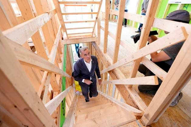 September 14, 2025, Ottawa, On, CAN: Prime Minister Mark Carney walks up the stairs as he tours a new modular home being built by Caivan Homes, at an announcement for the new federal agency Build Canada Homes, in Ottawa on Sunday, Sept. 14, 2025. Ottawa CAN  - ZUMAc35_ 20250914_zaf_c35_069 Copyright: xJustinxTangx