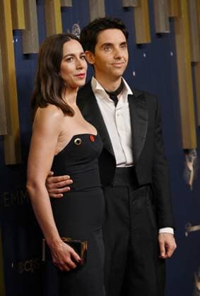 (L-R) Lucia Aniello and Paul W. Downs arrive for the 77th annual Primetime Emmy Awards at the Peacock Theater in Los Angeles on Sunday, September 14, 2025.  LAP2025091420 CHISxCHEW