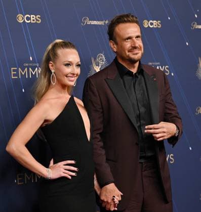 (L-R) Kayla Radomski and Jason Segel arrive for the 77th annual Primetime Emmy Awards at the Peacock Theater in Los Angeles on Sunday, September 14, 2025.  LAP2025091421 CHISxCHEW