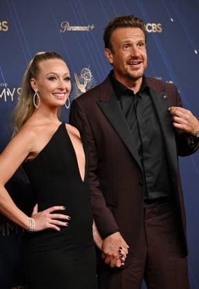 (L-R) Kayla Radomski and Jason Segel arrive for the 77th annual Primetime Emmy Awards at the Peacock Theater in Los Angeles on Sunday, September 14, 2025.  LAP2025091422 CHISxCHEW