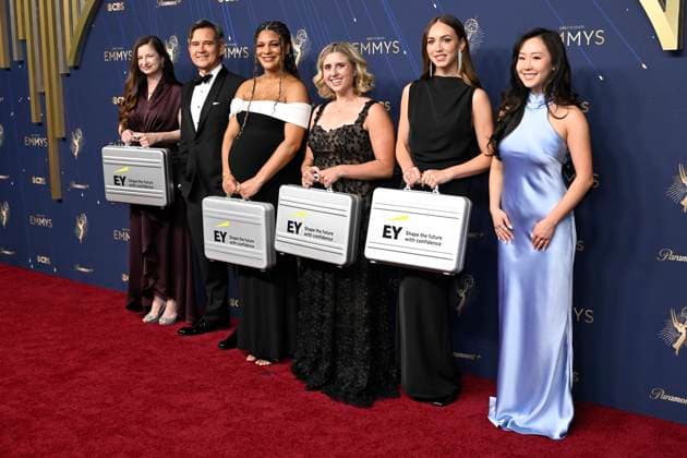 Suzane DeJong, Paul Chen, Jade Davis, Paige Zimmer, Greta Casagrande and Sophia Song bring in the winners before the the 77th annual Primetime Emmy Awards at the Peacock Theater in Los Angeles on Sunday, September 14, 2025.  LAP202509147011 JohnxMcCoy