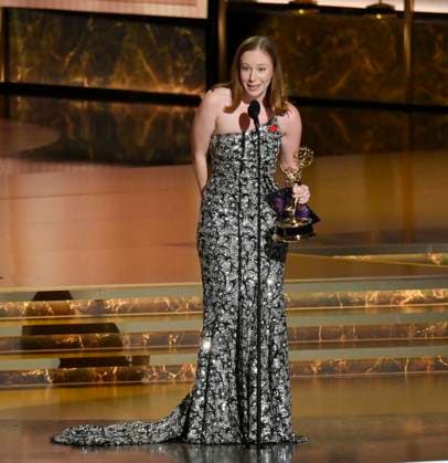 Hannah Einbinder accepts the Outstanding Supporting Actress in a Comedy Series award for Hacks onstage at the 77th annual Primetime Emmy Awards at the Peacock Theater in Los Angeles on Sunday, September 14, 2025.  LAP202509142063 JIMxRUYMEN