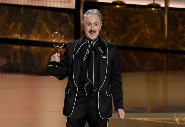 Alan Cumming accepts the Outstanding Reality Competition Program award for The Traitors at the 77th annual Primetime Emmy Awards at the Peacock Theater in Los Angeles on Sunday, September 14, 2025.  LAP202509148010 JIMxRUYMEN