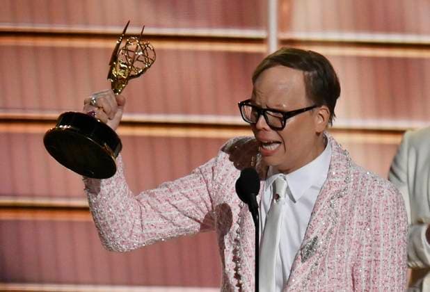 Jeff Hiller accepts the Outstanding Supporting Actor in a Comedy Series award for Somebody Somewhere onstage at the 77th annual Primetime Emmy Awards at the Peacock Theater in Los Angeles on Sunday, September 14, 2025.  LAP202509148024 JIMxRUYMEN