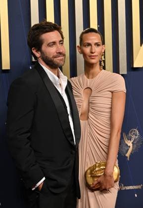 (L-R) Jake Gyllenhaal and Jeanne Cadieu arrive for the 77th annual Primetime Emmy Awards at the Peacock Theater in Los Angeles on Sunday, September 14, 2025.  LAP2025091496 CHISxCHEW