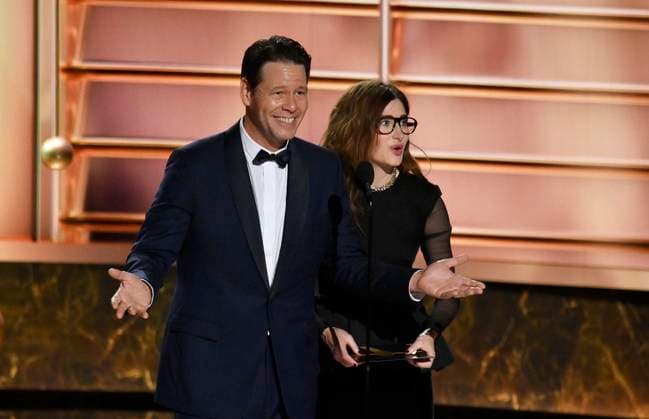 Ike Barinholtz and Kathryn Hahn speak at the 77th annual Primetime Emmy Awards at the Peacock Theater in Los Angeles on Sunday, September 14, 2025.  LAP2025091480462 JIMxRUYMEN