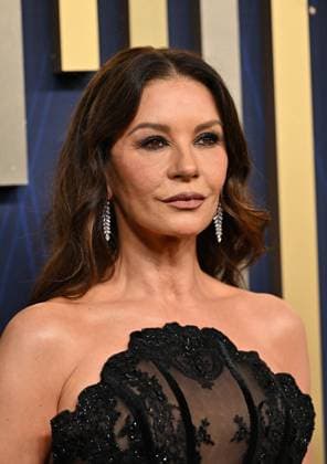 Catherine Zeta-Jones arrives for the 77th annual Primetime Emmy Awards at the Peacock Theater in Los Angeles on Sunday, September 14, 2025.  LAP20250914140 CHISxCHEW