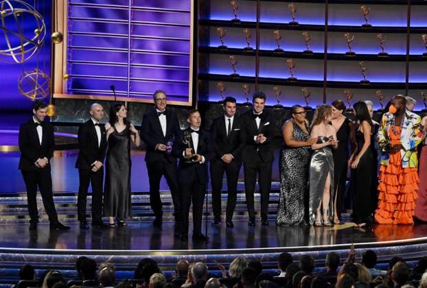 Daniel O Brien accepts the Outstanding Writing for a Variety Series award for Last Week Tonight with John Oliver onstage at the 77th annual Primetime Emmy Awards at the Peacock Theater in Los Angeles on Sunday, September 14, 2025.  LAP202509143033 JIMxRUYMEN