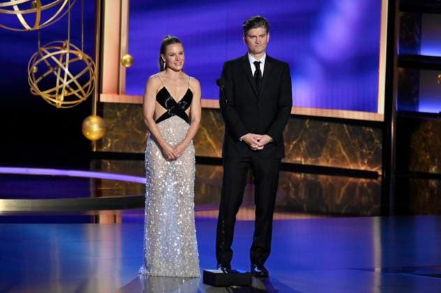 Kristen Bell and Michael Schur speak onstage at the 77th annual Primetime Emmy Awards at the Peacock Theater in Los Angeles on Sunday, September 14, 2025.  LAP202509143037 JIMxRUYMEN