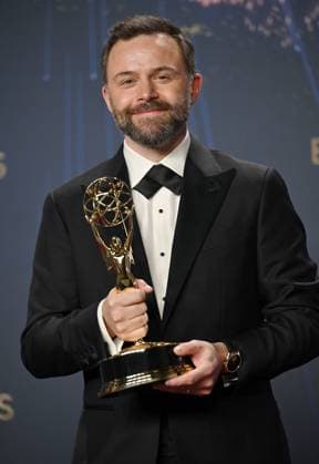 Philip Barantini holds the Emmy for Outstanding Directing for a Limited or Anthology Series or Movie for Adolescence, backstage during the 77th annual Primetime Emmy Awards at the Peacock Theater in Los Angeles on Sunday, September 14, 2025.  LAP20250914200 CHISxCHEW