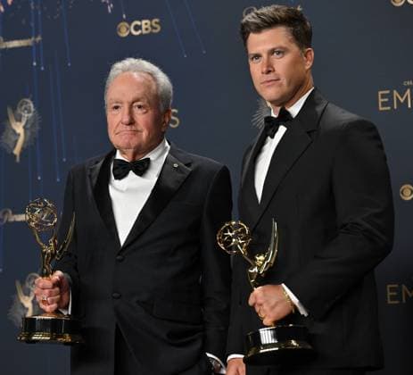 (L-R) Lorne Michaels and Colin Jost hold the Emmy for Outstanding Variety Special for SNL50: The Anniversary Special, backstage during the 77th annual Primetime Emmy Awards at the Peacock Theater in Los Angeles on Sunday, September 14, 2025.  LAP20250914203 CHISxCHEW