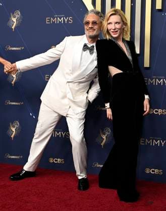 Taika Waititi photo bombs Cate Blanchette as they arrive for the 77th annual Primetime Emmy Awards at the Peacock Theater in Los Angeles on Sunday, September 14, 2025.  LAP20250914770 JohnxMcCoy