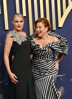 (L-R) Elaine Hendrix and Lisa Ann Walter arrive for the 77th annual Primetime Emmy Awards at the Peacock Theater in Los Angeles on Sunday, September 14, 2025.  LAP20250914222 CHISxCHEW
