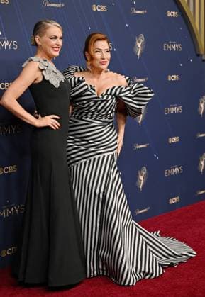 (L-R) Elaine Hendrix and Lisa Ann Walter arrive for the 77th annual Primetime Emmy Awards at the Peacock Theater in Los Angeles on Sunday, September 14, 2025.  LAP20250914223 CHISxCHEW