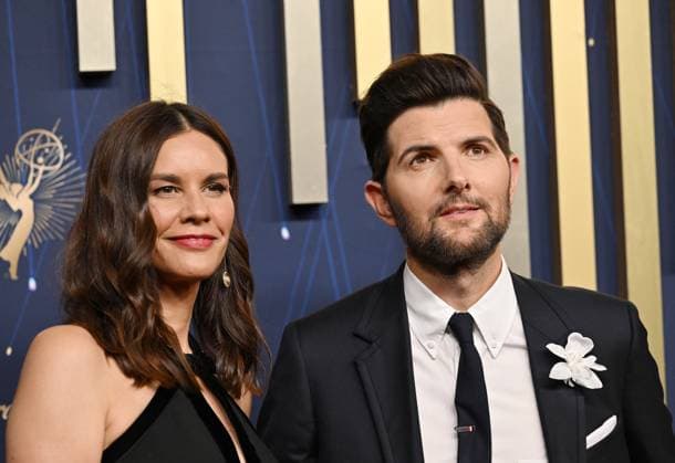 (L-R) Naomi Scott and Adam Scott arrive for the 77th annual Primetime Emmy Awards at the Peacock Theater in Los Angeles on Sunday, September 14, 2025.  LAP20250914226 CHISxCHEW