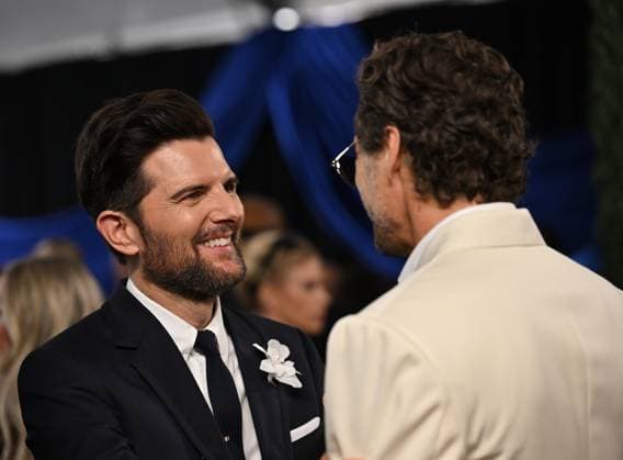 (L-R): Adam Scott and Pedro Pascal arrive for the 77th annual Primetime Emmy Awards at the Peacock Theater in Los Angeles on Sunday, September 14, 2025.  LAP20250914236 CHISxCHEW