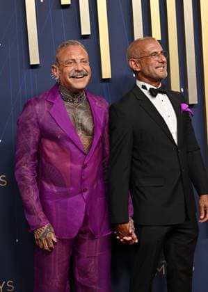 (L-R) Brad Carpenter and Chris Arruda arrive for the 77th annual Primetime Emmy Awards at the Peacock Theater in Los Angeles on Sunday, September 14, 2025.  LAP20250914278 CHISxCHEW